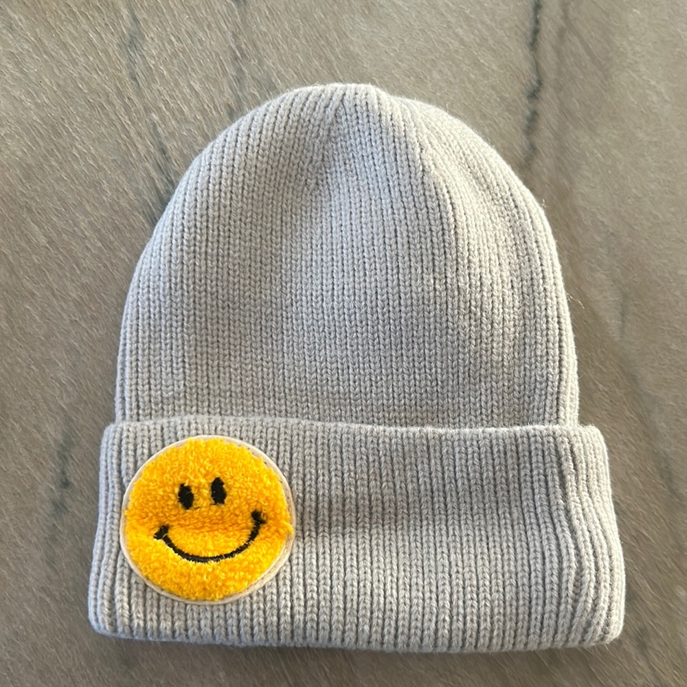 Kids ribbed beanie with smiley face patch detail